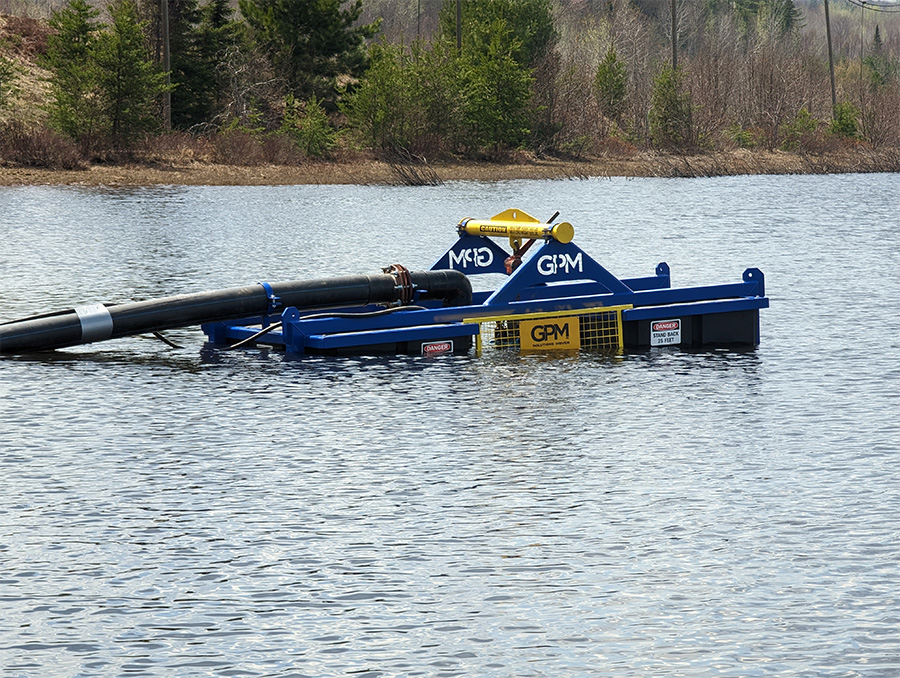 A GPM-Eliminator™ submersible pump system in a body of water.