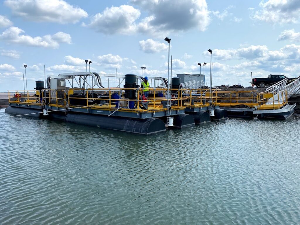 Floating Basin Dewatering Pump Dock on location